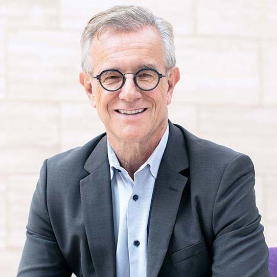 Headshot of Eric Verdin